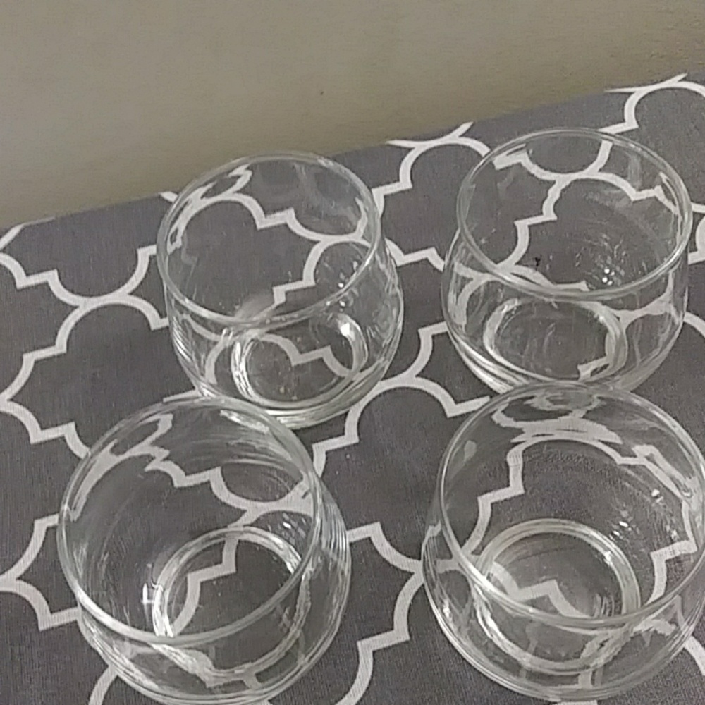 Four drinking glasses